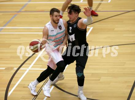 Basketball 2. Bundesliga. Grunddurchgang 11. Runde. Raiders Villach gegen Woerthersee Piraten. Martin Bajc,   (Villach),  Andreas Kuttnig (Piraten). Klagenfurt, am 16.12.2018.
Foto: Kuess
---
pressefotos, pressefotografie, kuess, qs, qspictures, sport, bild, bilder, bilddatenbank