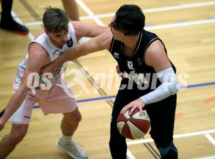 Basketball 2. Bundesliga. Grunddurchgang 11. Runde. Raiders Villach gegen Woerthersee Piraten.  Ziga Erculj,  (Villach), Andreas Kuttnig  (Piraten). Klagenfurt, am 16.12.2018.
Foto: Kuess
---
pressefotos, pressefotografie, kuess, qs, qspictures, sport, bild, bilder, bilddatenbank