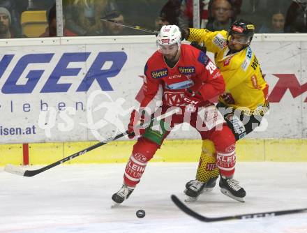 EBEL. Eishockey Bundesliga. KAC gegen	spusu Vienna Capitals. Martin Schumnig (KAC), Wukovits Ali (Vienna Capitals). Klagenfurt, am 23.12.2018.
Foto: Kuess

---
pressefotos, pressefotografie, kuess, qs, qspictures, sport, bild, bilder, bilddatenbank