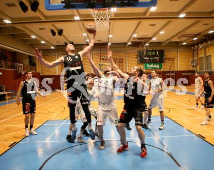 Basketball 2. Bundesliga. Grunddurchgang 14. Runde. KOS Celovec gegen   	BK Mattersburg Rocks. Jaka Stemberger (KOS), Corey Hallett, Maximilan Huebner (BK Mattersburg Rocks). Klagenfurt, am 13.1.2019.
Foto: Kuess
---
pressefotos, pressefotografie, kuess, qs, qspictures, sport, bild, bilder, bilddatenbank