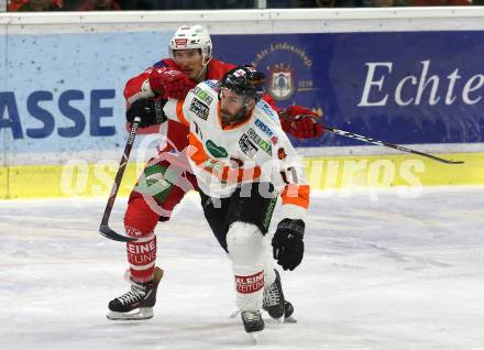 EBEL. Eishockey Bundesliga. KAC gegen	Moser Medical Graz99ers. Patrick Harand,  (KAC), Travis Oleksuk (Graz). Klagenfurt, am 31.3.2019.
Foto: Kuess

---
pressefotos, pressefotografie, kuess, qs, qspictures, sport, bild, bilder, bilddatenbank