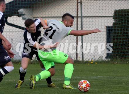 Fussball 2. Klasse C. Himmelberg gegen Gurk.  Milos Bogdanovic,  (Himmelberg), Marc Fessl  (Gurk). Himmelberg, am 27.4.2019.
Foto: Kuess
---
pressefotos, pressefotografie, kuess, qs, qspictures, sport, bild, bilder, bilddatenbank