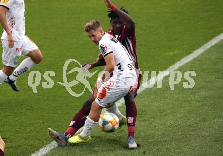 Fussball tipico Bundesliga. RZ Pellets WAC gegen Cashpoint SCR Altach.  Romano Christian Schmid, (WAC), Ousmane Diakite (Altach). Wolfsberg, am 24.8.2019.
Foto: Kuess
www.qspictures.net

---
pressefotos, pressefotografie, kuess, qs, qspictures, sport, bild, bilder, bilddatenbank