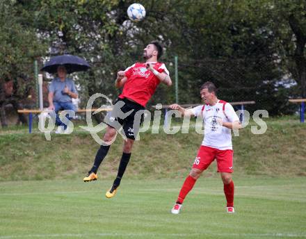 Fussball. Kaerntner Liga. Ferlach Atus gegen Spittal/Drau. Thomas Waldhauser  (Ferlach),  Dejan Kecanovic (Spittal). Ferlach, 24.8.2019.
Foto: Kuess
www.qspictures.net
---
pressefotos, pressefotografie, kuess, qs, qspictures, sport, bild, bilder, bilddatenbank