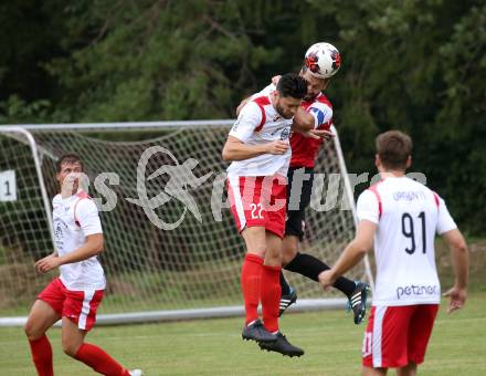 Fussball. Kaerntner Liga. Ferlach Atus gegen Spittal/Drau. Stephan Buergler (Ferlach), Daniel Trupp   (Spittal). Ferlach, 24.8.2019.
Foto: Kuess
www.qspictures.net
---
pressefotos, pressefotografie, kuess, qs, qspictures, sport, bild, bilder, bilddatenbank