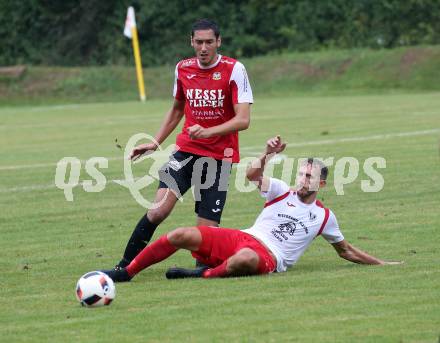 Fussball. Kaerntner Liga. Ferlach Atus gegen Spittal/Drau. Petar Maric (Ferlach),   Rafael Graf (Spittal). Ferlach, 24.8.2019.
Foto: Kuess
www.qspictures.net
---
pressefotos, pressefotografie, kuess, qs, qspictures, sport, bild, bilder, bilddatenbank