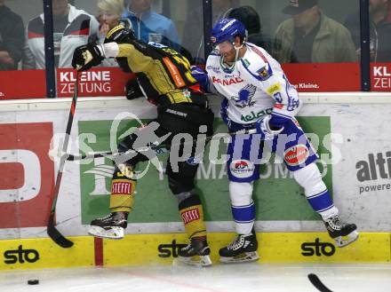 EBEL. Eishockey Bundesliga. EC VSV gegen spusu Vienna Capitals.  Martin Ulmer,  (VSV), Mark Flood (Vienna Capitals). Villach, am 20.9.2019.
Foto: Kuess
www.qspictures.net
---
pressefotos, pressefotografie, kuess, qs, qspictures, sport, bild, bilder, bilddatenbank