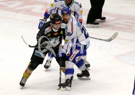 EBEL. Eishockey Bundesliga. EC VSV gegen spusu Vienna Capitals. Marko Poeyhoenen,  (VSV), Taylor Vause  (Vienna Capitals). Villach, am 20.9.2019.
Foto: Kuess
www.qspictures.net
---
pressefotos, pressefotografie, kuess, qs, qspictures, sport, bild, bilder, bilddatenbank