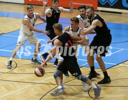 Basketball 2. Bundesliga. Grunddurchgang 1. Runde. Woerthersee Piraten gegen Mistelbach Mustangs. Lukas Simoner,  (Piraten), Michal Semerad (Mustangs). Klagenfurt, am 21.9.2019.
Foto: Kuess
www.qspictures.net

---
pressefotos, pressefotografie, kuess, qs, qspictures, sport, bild, bilder, bilddatenbank