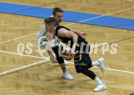 Basketball Zweite Liga 2019/2020. Grunddurchgang 9. Runde. KOS Celovec gegen  Guessing/Jennersdorf Blackbirds 	.  Tim Huber, (KOS Celovec),  Philipp Horvath  (Blackbirds). Klagenfurt, am 9.11.2019.
Foto: Kuess
www.qspictures.net

---
pressefotos, pressefotografie, kuess, qs, qspictures, sport, bild, bilder, bilddatenbank