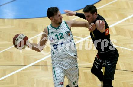 Basketball Zweite Liga 2019/2020. Grunddurchgang 9. Runde. KOS Celovec gegen  Guessing/Jennersdorf Blackbirds 	.  Tiso Cvetkovic,  (KOS Celovec),  Thomas Linzer (Blackbirds). Klagenfurt, am 9.11.2019.
Foto: Kuess
www.qspictures.net

---
pressefotos, pressefotografie, kuess, qs, qspictures, sport, bild, bilder, bilddatenbank