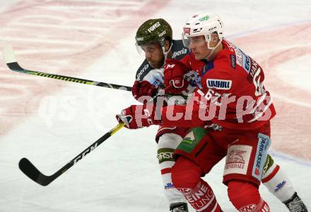 EBEL. Eishockey Bundesliga. KAC gegen	HCB Suedtirol Alperia. Petter Hansson,  (KAC), Anthony Bardaro (Bozen). Klagenfurt, am 24.11.2019.
Foto: Kuess
www.qspictures.net

---
pressefotos, pressefotografie, kuess, qs, qspictures, sport, bild, bilder, bilddatenbank