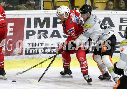 EBEL. Eishockey Bundesliga. KAC gegen	Dornbirn Bulldogs. Manuel Geier,  (KAC), Stefan Haeussle (Dornbirn). Klagenfurt, am 1.12.2019.
Foto: Kuess
www.qspictures.net

---
pressefotos, pressefotografie, kuess, qs, qspictures, sport, bild, bilder, bilddatenbank