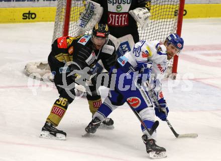 EBEL. Eishockey Bundesliga. EC VSV gegen spusu Vienna Capitals.  Marko Ppoeyhoenen,  (VSV), Mark Flood (Vienna Capitals). Villach, am 8.12.2019.
Foto: Kuess
www.qspictures.net
---
pressefotos, pressefotografie, kuess, qs, qspictures, sport, bild, bilder, bilddatenbank