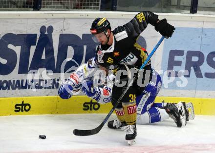 EBEL. Eishockey Bundesliga. EC VSV gegen spusu Vienna Capitals. Marko Poeyhoenen,  (VSV), Dario Winkler  (Vienna Capitals). Villach, am 8.12.2019.
Foto: Kuess
www.qspictures.net
---
pressefotos, pressefotografie, kuess, qs, qspictures, sport, bild, bilder, bilddatenbank