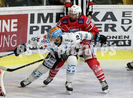 EBEL. Eishockey Bundesliga. KAC gegen	EHC Liwest Black Wings Linz. Martin Schumnig, (KAC), Justin Florek  (Linz). Klagenfurt, am 15.12.2019.
Foto: Kuess
www.qspictures.net

---
pressefotos, pressefotografie, kuess, qs, qspictures, sport, bild, bilder, bilddatenbank