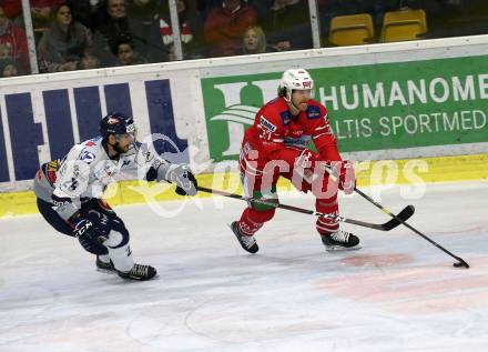 EBEL. Eishockey Bundesliga. KAC gegen	Hydro Fehervar AV 19. Hundertpfund Thomas (KAC),  Szabo Daniel (Alba Volan). Klagenfurt, am 15.12.2019.
Foto: Kuess
www.qspictures.net

---
pressefotos, pressefotografie, kuess, qs, qspictures, sport, bild, bilder, bilddatenbank