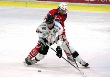 EBEL. Eishockey Bundesliga. KAC gegen	Moser Medical Graz99ers. Martin Schumnig, (KAC), Alexander Reichenberg  (Graz). Klagenfurt, am 28.12.2019.
Foto: Kuess
www.qspictures.net

---
pressefotos, pressefotografie, kuess, qs, qspictures, sport, bild, bilder, bilddatenbank