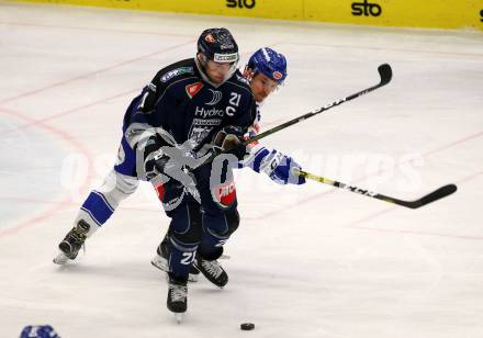 EBEL. Eishockey Bundesliga. VSV gegen Hydro Fehervar AV 19.  Brodie Reid,  (VSV), Daniel Koger (Fehervar). Villach, am 10.1.2020.
Foto: Kuess
www.qspictures.net
---
pressefotos, pressefotografie, kuess, qs, qspictures, sport, bild, bilder, bilddatenbank