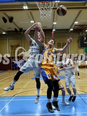 Basketball Zweite Liga 2019/2020. Grunddurchgang 17. Runde. KOS Celovec gegen  BBU Salzburg.  Lovro Fizuleto (KOS Celovec),  Guillermo Sanchez Daza (Salzburg). Klagenfurt, am 11.1.2020.
Foto: Kuess
www.qspictures.net

---
pressefotos, pressefotografie, kuess, qs, qspictures, sport, bild, bilder, bilddatenbank