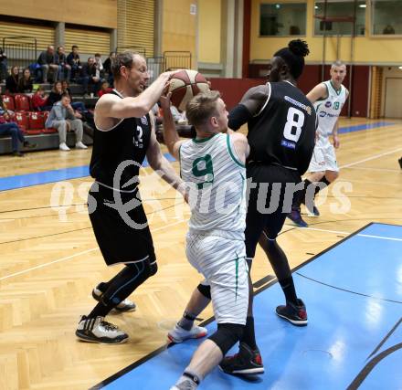 Basketball Zweite Liga 2019/2020. Grunddurchgang 19. Runde. KOS Celovec gegen  Raiders Tirol. Tim Huber (KOS Celovec), Andreas Scheicher, Mansata Cisse (Tirol). Klagenfurt, am 25.1.2020.
Foto: Kuess
www.qspictures.net

---
pressefotos, pressefotografie, kuess, qs, qspictures, sport, bild, bilder, bilddatenbank