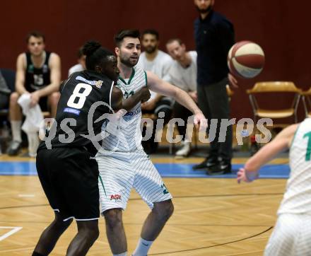 Basketball Zweite Liga 2019/2020. Grunddurchgang 19. Runde. KOS Celovec gegen  Raiders Tirol.  Marin Sliskovic (KOS Celovec), Mansata Cisse (Tirol). Klagenfurt, am 25.1.2020.
Foto: Kuess
www.qspictures.net

---
pressefotos, pressefotografie, kuess, qs, qspictures, sport, bild, bilder, bilddatenbank