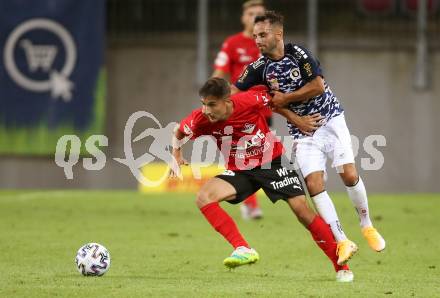 Fussball OEFB Cup. SK Austria KLagenfurt gegen Stadl-Paura. Okan Aydin, (Klagenfurt), Miroslav Cirkovic  (Stadl-Paura). KLagenfurt, am 28.8.2020.
Foto: Kuess
---
pressefotos, pressefotografie, kuess, qs, qspictures, sport, bild, bilder, bilddatenbank