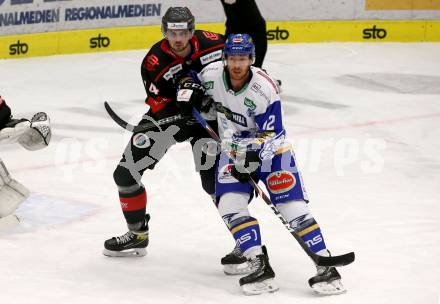 EBEL. Eishockey Bundesliga. VSV gegen Bratislava Capitals.  Michael Raffl, (VSV), Ladislav Romancik  (Bratislava). Villach, am 8.12.2020.
Foto: Kuess
www.qspictures.net
---
pressefotos, pressefotografie, kuess, qs, qspictures, sport, bild, bilder, bilddatenbank