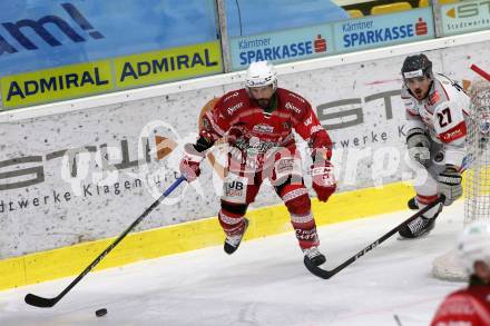 EBEL. Eishockey Bundesliga. KAC gegen	spusu Bratislava Capitals.  Thomas Koch  (KAC),  Cajkovic Maxim (Bratislava). Klagenfurt, am 13.12.2020.
Foto: Kuess
www.qspictures.net

---
pressefotos, pressefotografie, kuess, qs, qspictures, sport, bild, bilder, bilddatenbank