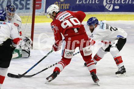 EBEL. Eishockey Bundesliga. KAC gegen	HC TIWAG Innsbruck. Matthew Fraser,  (KAC), Colton Jay Saucerman (Innsbruck). Klagenfurt, am 20.12.2020.
Foto: Kuess
www.qspictures.net

---
pressefotos, pressefotografie, kuess, qs, qspictures, sport, bild, bilder, bilddatenbank