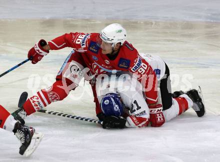 EBEL. Eishockey Bundesliga. KAC gegen	HC TIWAG Innsbruck. Matthew Fraser,  (KAC), Colton Jay Saucerman (Innsbruck). Klagenfurt, am 20.12.2020.
Foto: Kuess
www.qspictures.net

---
pressefotos, pressefotografie, kuess, qs, qspictures, sport, bild, bilder, bilddatenbank