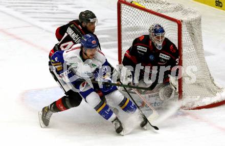 EBEL. Eishockey Bundesliga. VSV gegen Bratislava Capitals. Renars Krastenbergs,  (VSV),  Ladislav Romancik, Jared Coreau  (Bratislava). Villach, am 29.1.2021.
Foto: Kuess
www.qspictures.net
---
pressefotos, pressefotografie, kuess, qs, qspictures, sport, bild, bilder, bilddatenbank