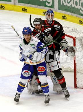 EBEL. Eishockey Bundesliga. VSV gegen Bratislava Capitals. Renars Krastenbergs,   (VSV), Ladislav Romancik, Jared Coreau (Bratislava). Villach, am 29.1.2021.
Foto: Kuess
www.qspictures.net
---
pressefotos, pressefotografie, kuess, qs, qspictures, sport, bild, bilder, bilddatenbank