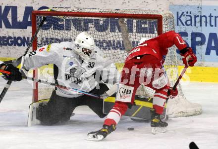 EBEL. Eishockey Bundesliga. KAC gegen	Dornbirner EC. Rok Ticar, (KAC),  Thomas Hoeneckl  (Dornbirn). Klagenfurt, am 31.1.2021.
Foto: Kuess
www.qspictures.net

---
pressefotos, pressefotografie, kuess, qs, qspictures, sport, bild, bilder, bilddatenbank