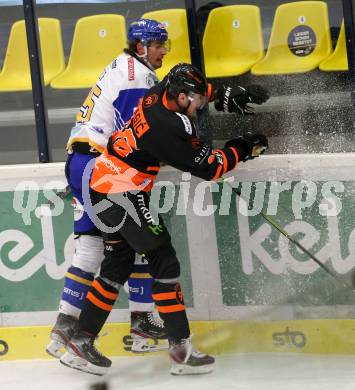 EBEL. Eishockey Bundesliga. VSV gegen Moser Medical Graz 99ers.  Raphael Wolf,  (VSV), Adis Alagic (Graz). Villach, am 23.2.2021.
Foto: Kuess
www.qspictures.net
---
pressefotos, pressefotografie, kuess, qs, qspictures, sport, bild, bilder, bilddatenbank