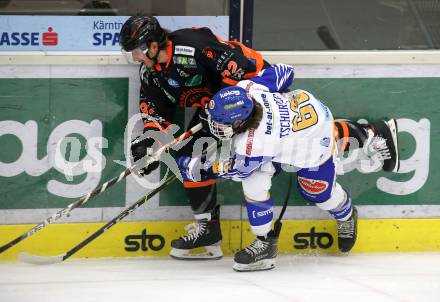 EBEL. Eishockey Bundesliga. VSV gegen Moser Medical Graz 99ers.  Johannes Tschurnig,  (VSV), Charles Dodero (Graz). Villach, am 23.2.2021.
Foto: Kuess
www.qspictures.net
---
pressefotos, pressefotografie, kuess, qs, qspictures, sport, bild, bilder, bilddatenbank