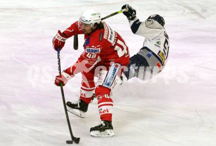 EBEL. Eishockey Bundesliga. KAC gegen	Fehervar AV19. Samuel Witting, (KAC),  Timothy Campbell  (Fehervar). Klagenfurt, am 7.3.2021.
Foto: Kuess
www.qspictures.net

---
pressefotos, pressefotografie, kuess, qs, qspictures, sport, bild, bilder, bilddatenbank