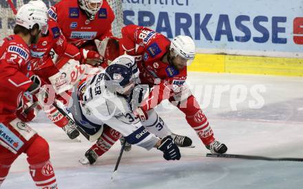 EBEL. Eishockey Bundesliga. KAC gegen	Fehervar AV19. Daniel Obersteiner,  (KAC), Paul Geiger  (Fehervar). Klagenfurt, am 7.3.2021.
Foto: Kuess
www.qspictures.net

---
pressefotos, pressefotografie, kuess, qs, qspictures, sport, bild, bilder, bilddatenbank