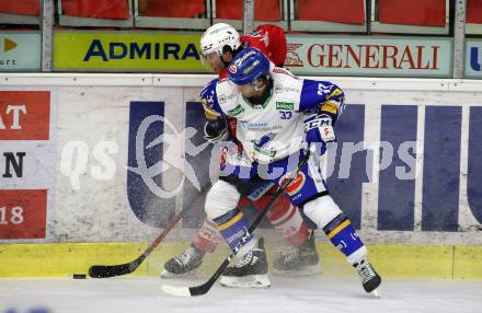 EBEL. Eishockey Bundesliga. KAC gegen	VSV. Rok Ticar, (KAC),  Martin Ulmer   (VSV). Klagenfurt, am 12.3.2021.
Foto: Kuess
www.qspictures.net

---
pressefotos, pressefotografie, kuess, qs, qspictures, sport, bild, bilder, bilddatenbank