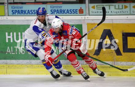 EBEL. Eishockey Bundesliga. KAC gegen	VSV. Rok Ticar (KAC),  Kevin Schmidt  (VSV). Klagenfurt, am 16.3.2021.
Foto: Kuess
www.qspictures.net

---
pressefotos, pressefotografie, kuess, qs, qspictures, sport, bild, bilder, bilddatenbank