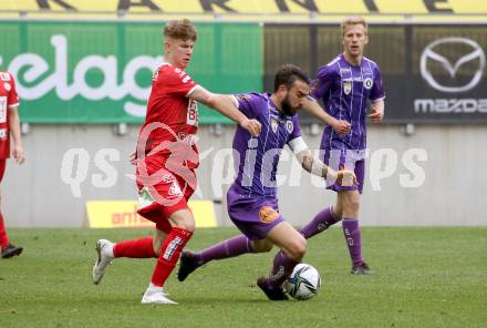 Fussball 2. Liga. SK Austria Klagenfurt gegen  Grazer AK 1902. Kosmas Gkezos,  (Klagenfurt),  Paul Kiedl  (GAK). Klagenfurt, am 18.4.2021.
Foto: Kuess
www.qspictures.net
---
pressefotos, pressefotografie, kuess, qs, qspictures, sport, bild, bilder, bilddatenbank