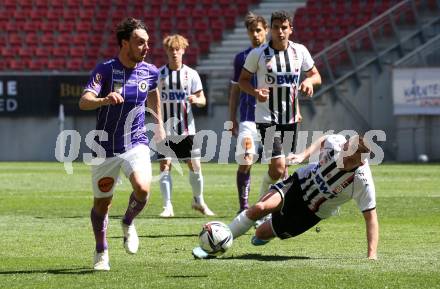 Fussball 2. Liga. SK Austria Klagenfurt gegen FC Juniors OOE. Simon Straudi, (Klagenfurt), Mirsad Sulejmanovic  (Juniors). Klagenfurt, am 9.5.2021.
Foto: Kuess
www.qspictures.net
---
pressefotos, pressefotografie, kuess, qs, qspictures, sport, bild, bilder, bilddatenbank