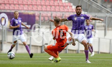 Fussball 2. Liga. SK Austria Klagenfurt gegen SV Horn.  Markus Pink,  (Klagenfurt), Florian Sittsam  (Horn). Klagenfurt, am 16.5.2021.
Foto: Kuess
www.qspictures.net
---
pressefotos, pressefotografie, kuess, qs, qspictures, sport, bild, bilder, bilddatenbank