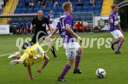 Fussball. Bundesliga Relegation. St. Poelten gegen SK Austria Klagenfurt .   Brandon Ivan Servania,   (St. Poelten), Christopher Cvetko,  (Klagenfurt). Klagenfurt, am 29.5.2021.
Foto: Kuess
www.qspictures.net
---
pressefotos, pressefotografie, kuess, qs, qspictures, sport, bild, bilder, bilddatenbank