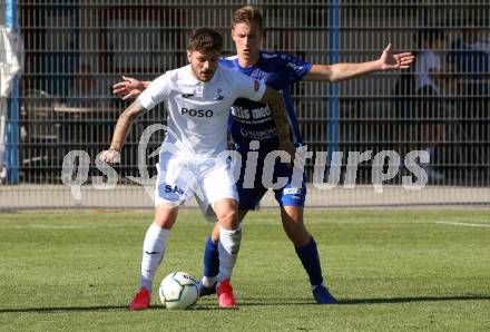 Fussball Kaerntner Liga. SAK gegen Treibach.  Amer Krcic (SAK), Raffael Mario Kaefer (Treibach). KLagenfurt, am 26.6.2021.
Foto: Kuess
---
pressefotos, pressefotografie, kuess, qs, qspictures, sport, bild, bilder, bilddatenbank