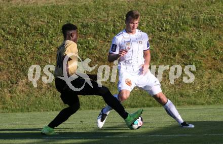 Fussball. Freundschaftsspiel. Koettmannsdorf gegen Austria Klagenfurt.   Confidence Eboigbe Osawe (Koettmannsdorf),   Florian Freissegger (Klagenfurt). Klagenfurt, am 28.6.2021.
Foto: Kuess
www.qspictures.net
---
pressefotos, pressefotografie, kuess, qs, qspictures, sport, bild, bilder, bilddatenbank