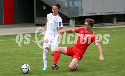 Fussball Bundesliga. Terstspiel. FC St. Veit gegen SK Austria Klagenfurt.  Christian Flores (St.Veit), Alex Timossi Andersson  (Klagenfurt). St. Veit, am 13.7.2021.
Foto: Kuess
---
pressefotos, pressefotografie, kuess, qs, qspictures, sport, bild, bilder, bilddatenbank