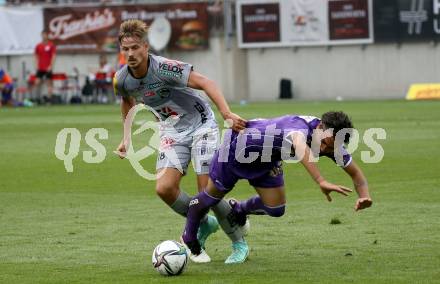 Fussball. Bundesliga. SK Austria Klagenfurt gegen WAC.  Maximiliano Moreira Romero (Klagenfurt), Thorsten Roecher (WAC). Klagenfurt, am 25.7.2021.
Foto: Kuess
www.qspictures.net
---
pressefotos, pressefotografie, kuess, qs, qspictures, sport, bild, bilder, bilddatenbank