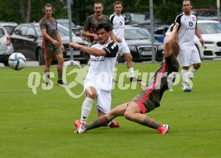 Fussball 1. Klasse B. Kleinkirchheim gegen Velden.  Mario Hubert Trattler  (Kleinkirchheim),  Roland Putsche (Velden). Kleinkirchheim, am 25.7.2021.
Foto: Kuess
---
pressefotos, pressefotografie, kuess, qs, qspictures, sport, bild, bilder, bilddatenbank