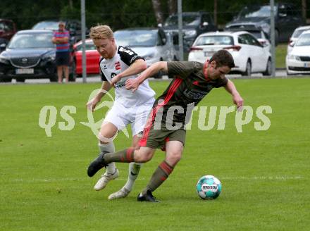 Fussball 1. Klasse B. Kleinkirchheim gegen Velden. Thomas Alexander Dabernig  (Kleinkirchheim), Niklas Janke  (Velden). Kleinkirchheim, am 25.7.2021.
Foto: Kuess
---
pressefotos, pressefotografie, kuess, qs, qspictures, sport, bild, bilder, bilddatenbank